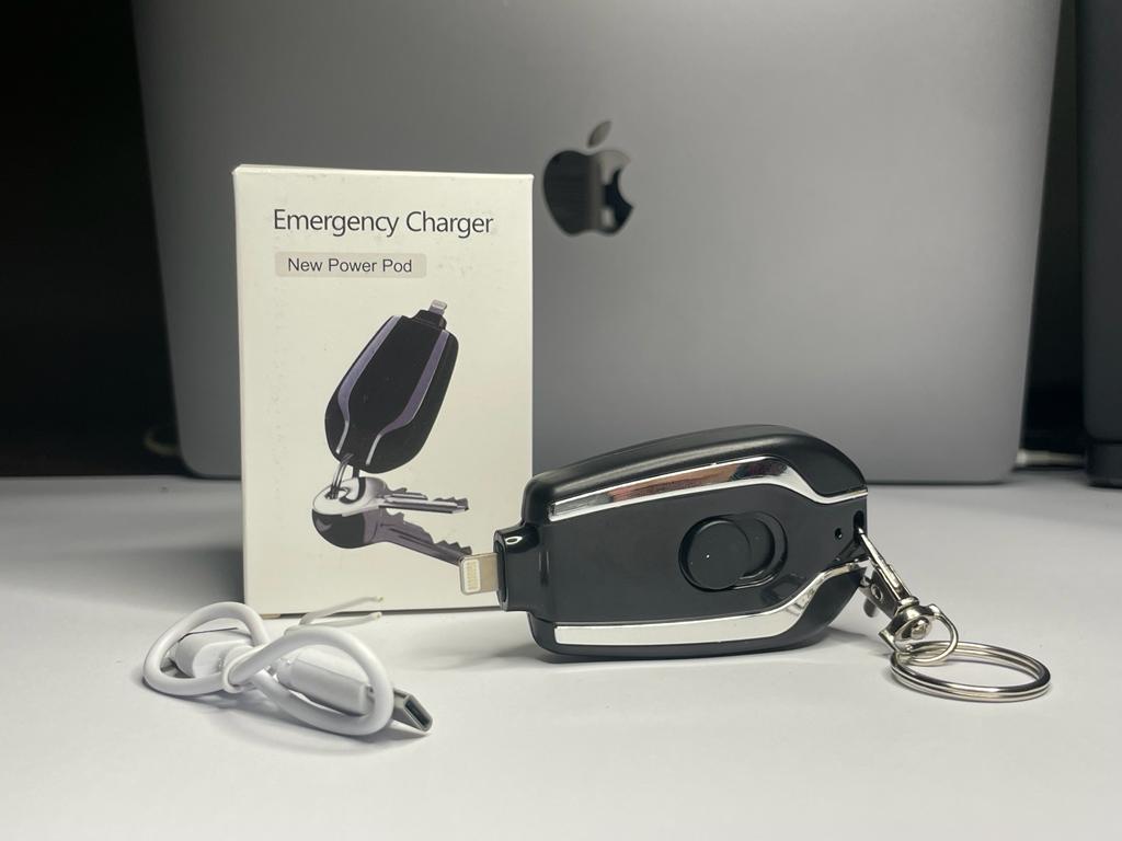 Tiny phone charger on keychain. Boosts phone battery in a pinch. Clips on keys for easy carrying.